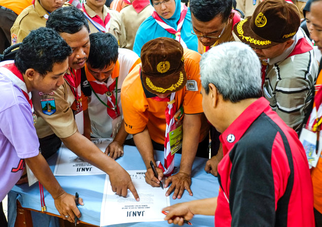 Scout leaders and teachers sign a drug-free pledge